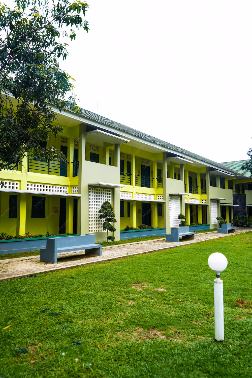 School building with green lawn